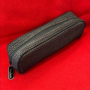 Vintage Neiman Marcus cosmetic zippered pouch.